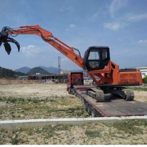 Scrap metal orange grab excavator